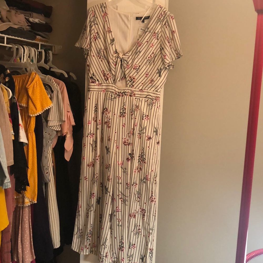 Grey, pink, and white striped and floral romper.